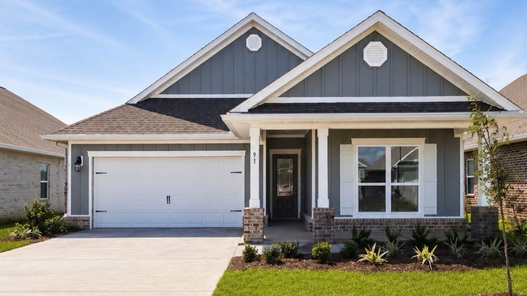 Front exterior of a new home in Owl's Head Farms, Freeport, FL, highlighting curb appeal (Image 1). Front exterior of a new home in Owl's Head Farms, Freeport, FL, highlighting curb appeal (Image 1).