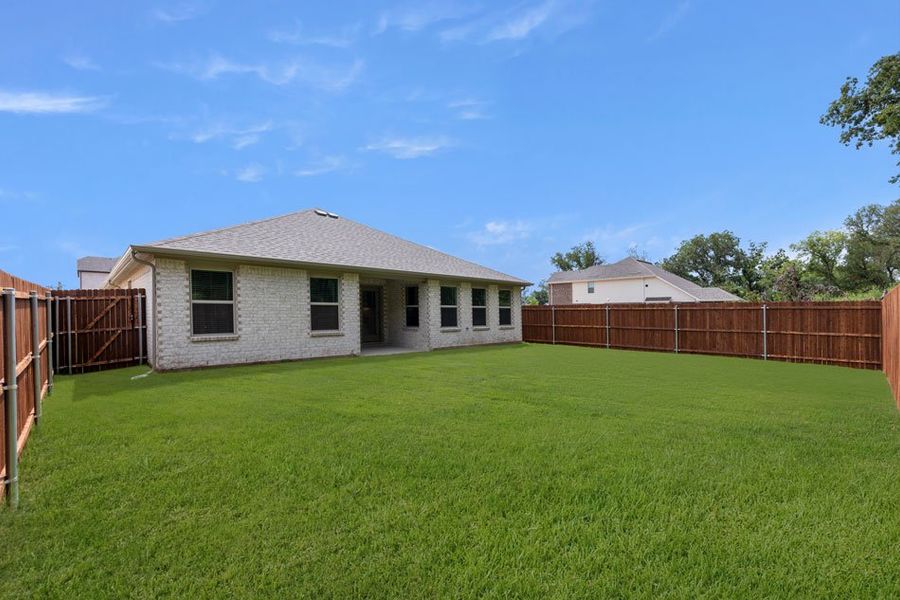 Representative exterior photo of a completed home built from the Boston by Impression Homes in Keeneland, Aubrey, TX (Image 25).