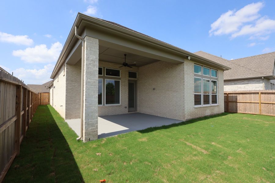 Exterior details and patio area of a home in Harvest Green - Reserve Collection, Richmond (Image 4).
