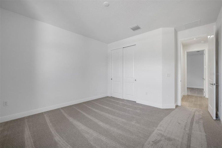 Spacious, unfurnished interior of a new home in Angeline, Land O' Lakes (Image 42).