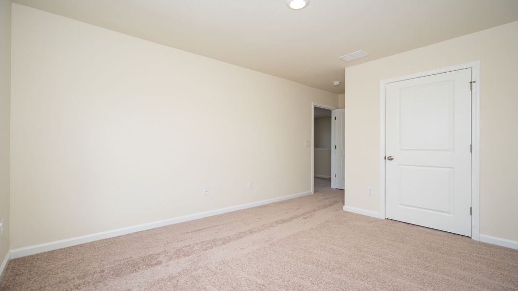 Spacious, unfurnished interior of a new home in The Pines at Blake Farm, Wilmington (Image 23).