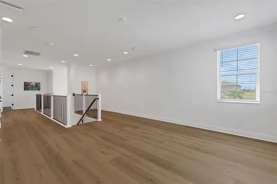 Spacious, unfurnished interior of a new home in Cassata Lakes, Nokomis (Image 63).