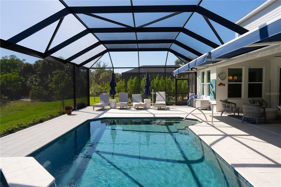 Exterior details and patio area of a home in , Sarasota (Image 22).