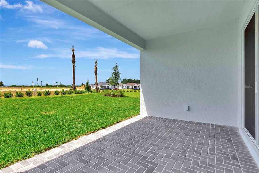 Exterior details and patio area of a home in Cresswind at Lake Harris, Tavares (Image 33).