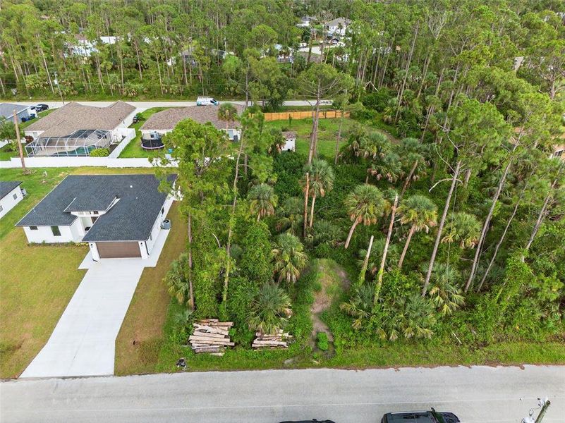 Front exterior of a new home in , North Port, FL, highlighting curb appeal (Image 27). Front exterior of a new home in , North Port, FL, highlighting curb appeal (Image 27).
