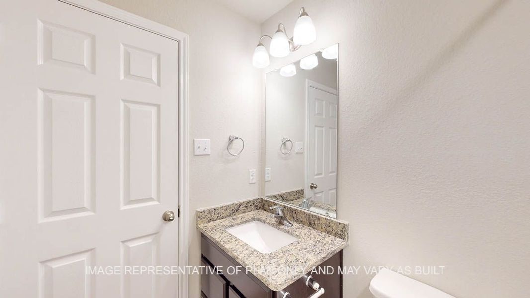 Furnished interior view inside a new home in Creekfall, Burnet (Image 12).