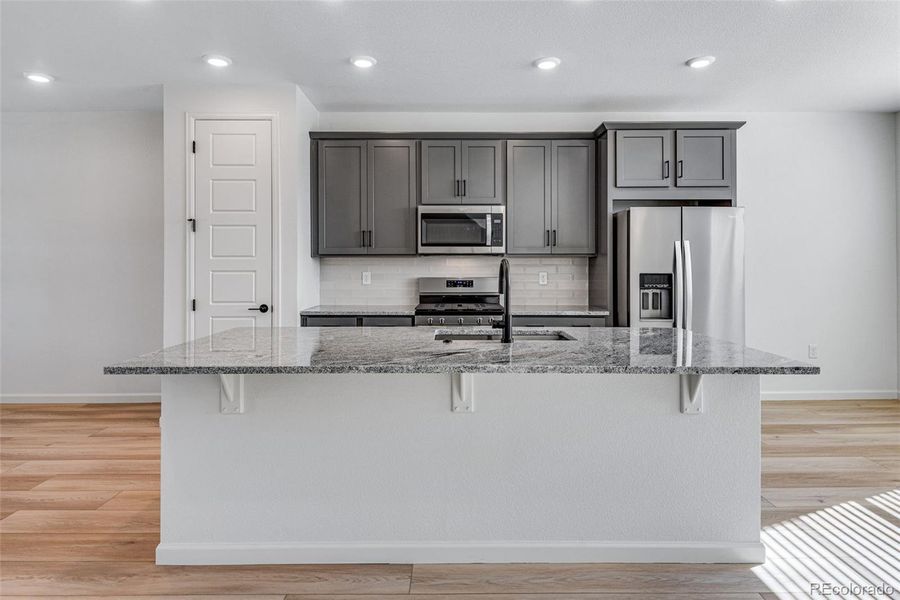 Furnished interior view inside a new home in , Arvada (Image 8).