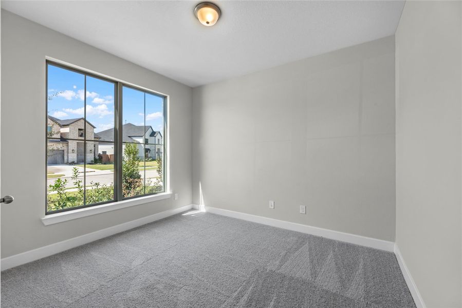 Spacious, unfurnished interior of a new home in Sunterra, Katy (Image 13).