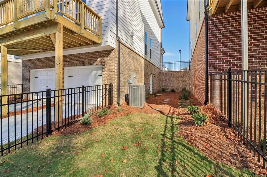 Exterior details and patio area of a home in Brackley Single Family, Cumming (Image 3). Exterior details and patio area of a home in Brackley Single Family, Cumming (Image 3).