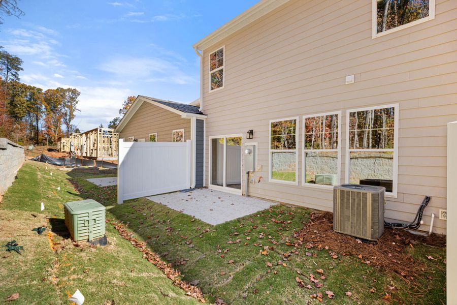 Exterior details and patio area of a home in Harbor Crossing, Greensboro (Image 26).