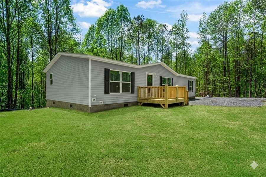 Exterior details and patio area of a home in , Ellijay (Image 27).