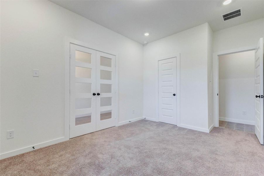 Versatile space ideal for a home office, study, or guest room.