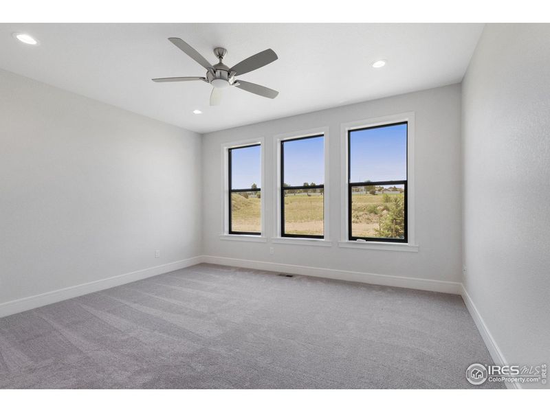 Spacious, unfurnished interior of a new home in Cottages at Kelly Farm, Greeley (Image 30).