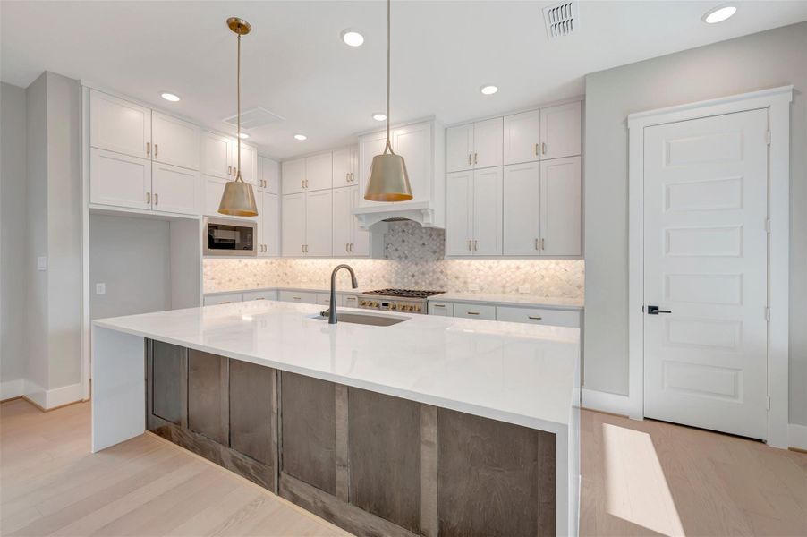 Furnished interior view inside a new home in Easthaven at Bridgeland Central - Vision Collection, Cypress (Image 2).