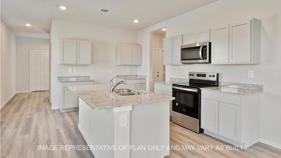 Furnished interior view inside a new home in Midtown Reserve, College Station (Image 2).