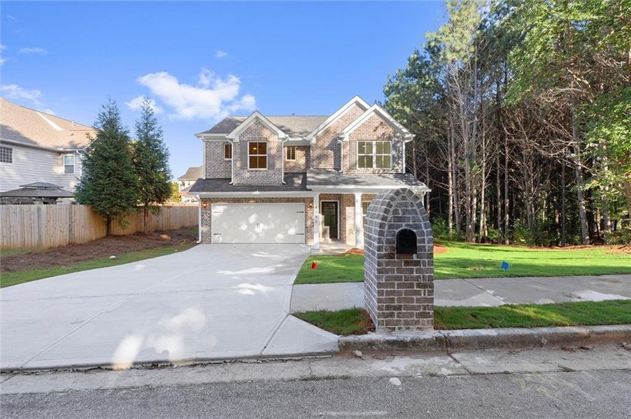 Front exterior of a new home in , Douglasville, GA, highlighting curb appeal (Image 1). Front exterior of a new home in , Douglasville, GA, highlighting curb appeal (Image 1).