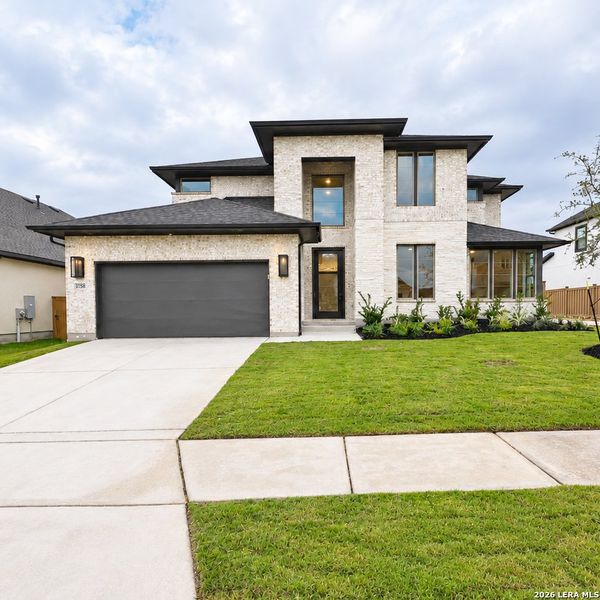 Front exterior of a new home in Mayfair, New Braunfels, TX, highlighting curb appeal (Image 2).