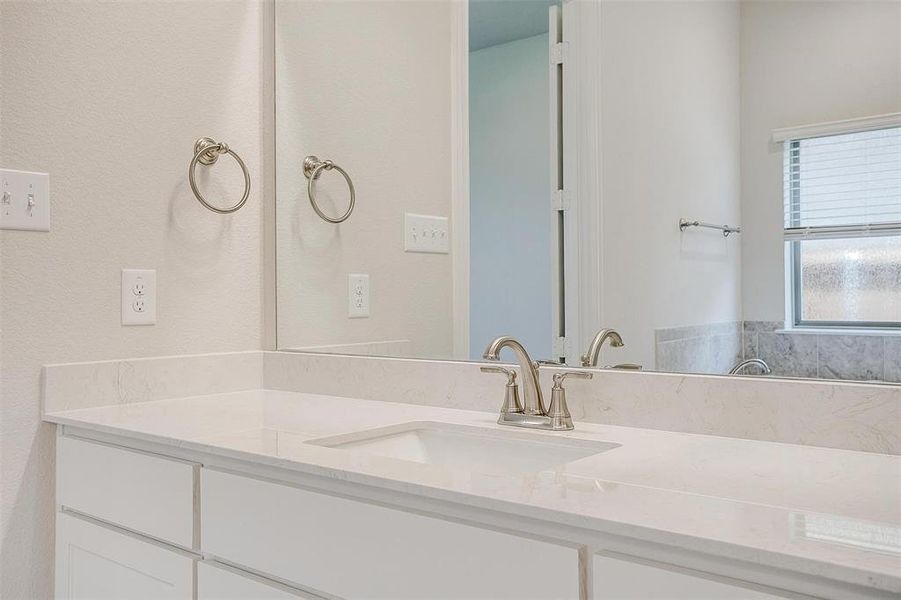 Bathroom featuring vanity