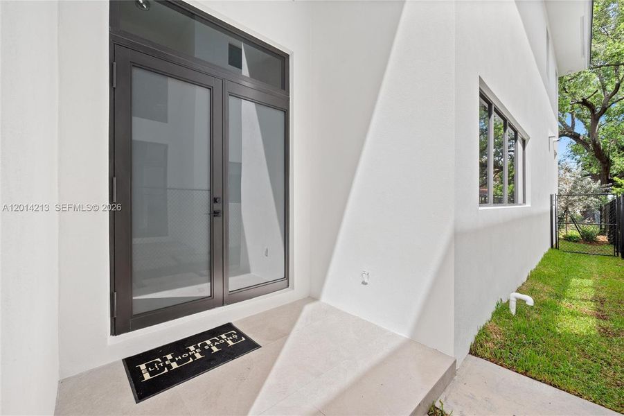 Exterior details and patio area of a home in , Miami (Image 3). Exterior details and patio area of a home in , Miami (Image 3).