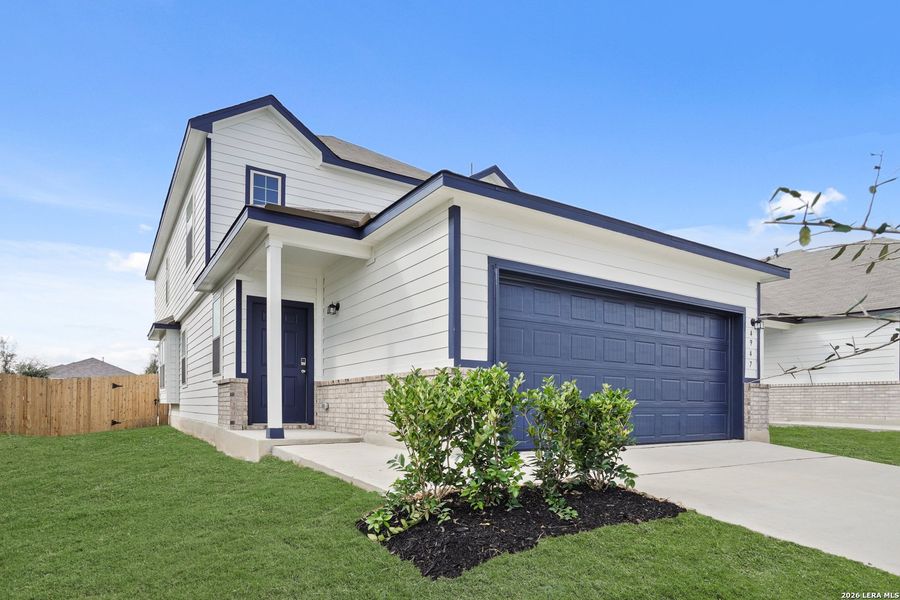 Front exterior of a new home in Blue Ridge Ranch, San Antonio, TX, highlighting curb appeal (Image 1). Front exterior of a new home in Blue Ridge Ranch, San Antonio, TX, highlighting curb appeal (Image 1).
