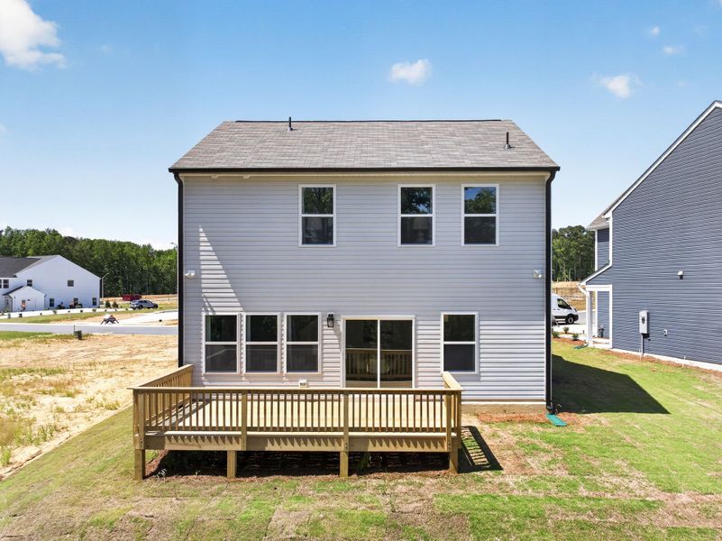 Exterior details and patio area of a home in White Oak Creek Crossing, Angier (Image 25).