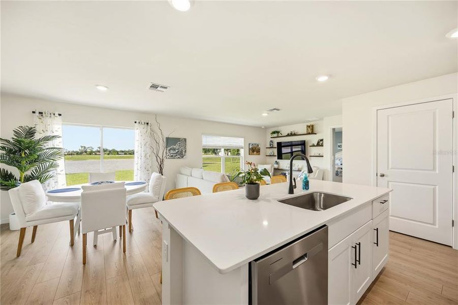 Furnished interior view inside a new home in Central Parc, North Port (Image 27).