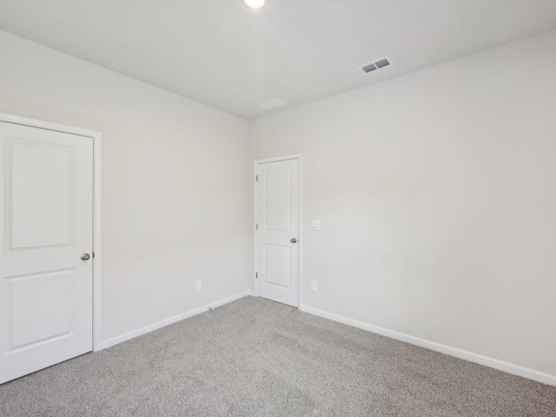 Spacious, unfurnished interior of a new home in Martin Springs - Estate Series, Lawrenceville (Image 29).