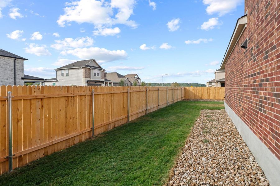 Exterior details and patio area of a home in River Bluff, Leander (Image 21).