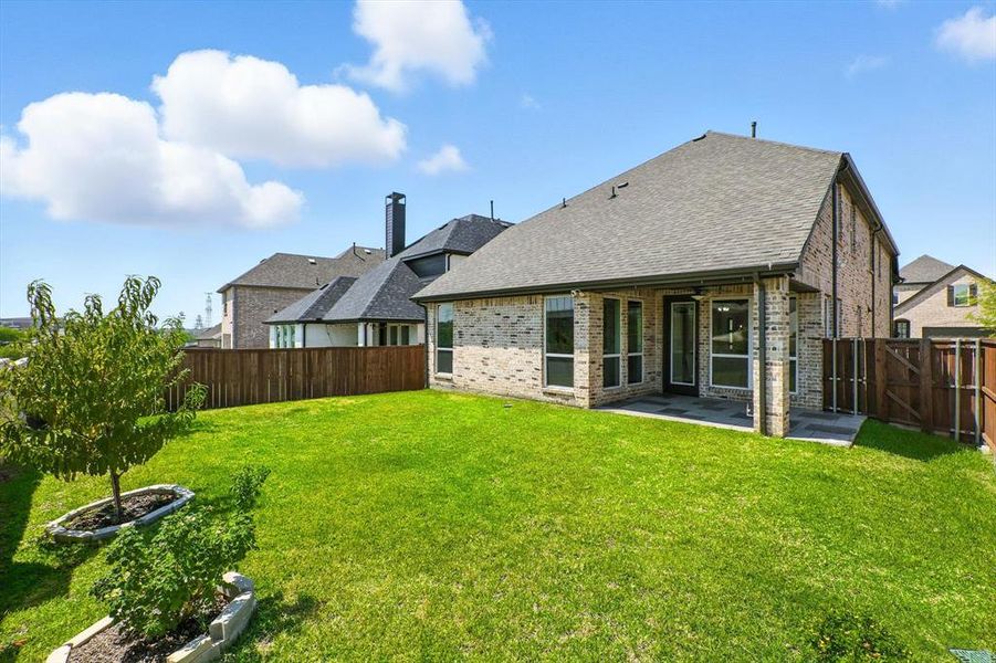 Front exterior of a new home in , Lewisville, TX, highlighting curb appeal (Image 25). Front exterior of a new home in , Lewisville, TX, highlighting curb appeal (Image 25).
