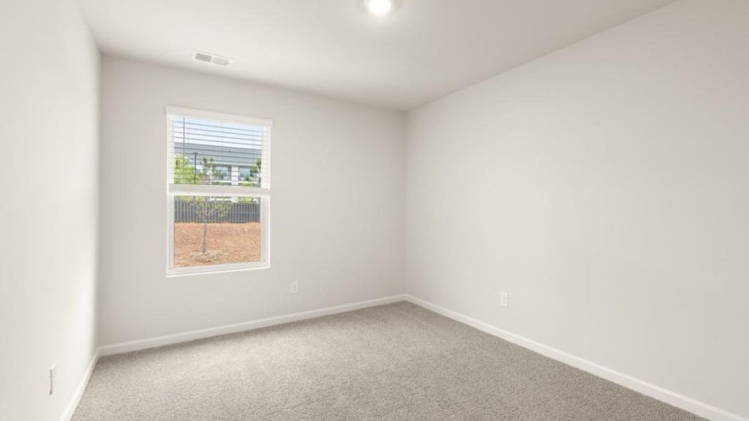 Spacious, unfurnished interior of a new home in Carlton, Douglasville (Image 9).