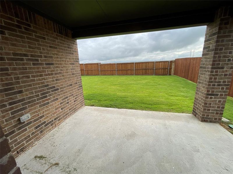 Exterior details and patio area of a home in Elevon, Lavon (Image 3).