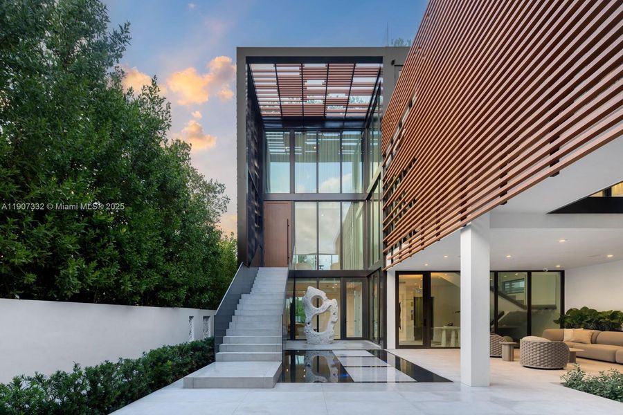 Exterior details and patio area of a home in , Miami Beach (Image 27). Exterior details and patio area of a home in , Miami Beach (Image 27).