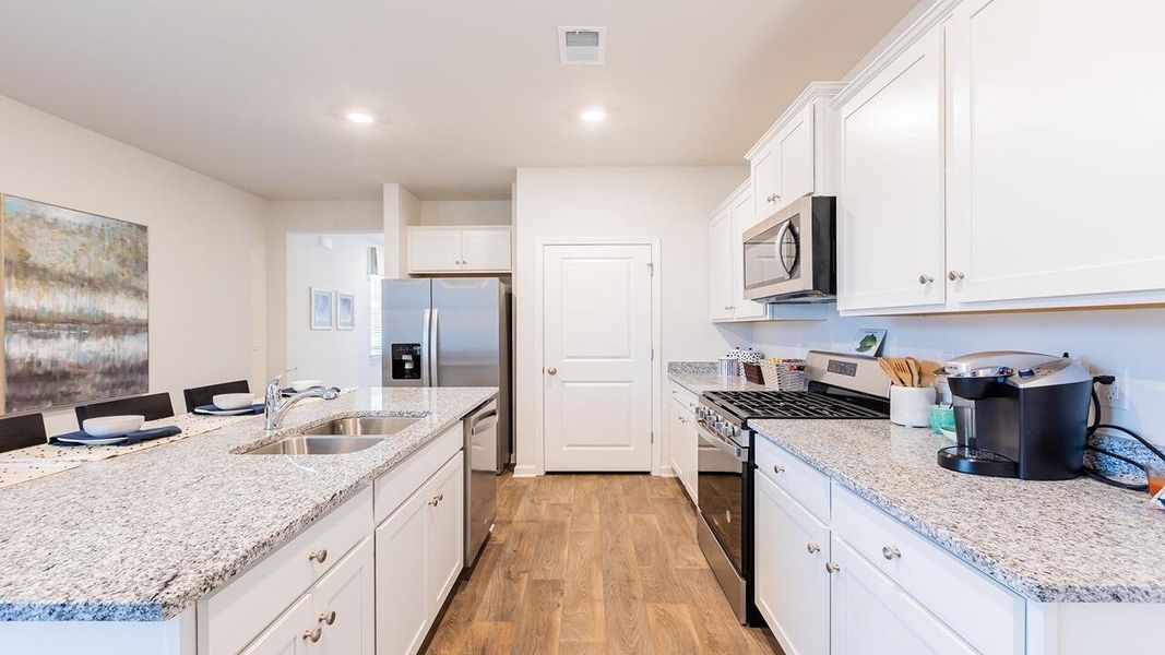 Furnished interior view inside a new home in Pine Hills at Cane Bay, Summerville (Image 18).