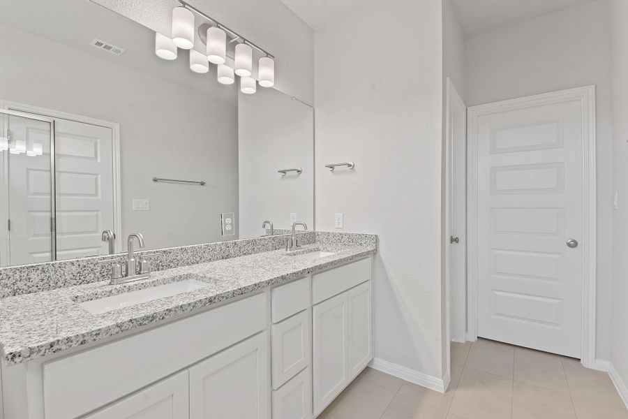 Furnished interior view inside a new home in Retreat at Hero Way, Leander (Image 13).