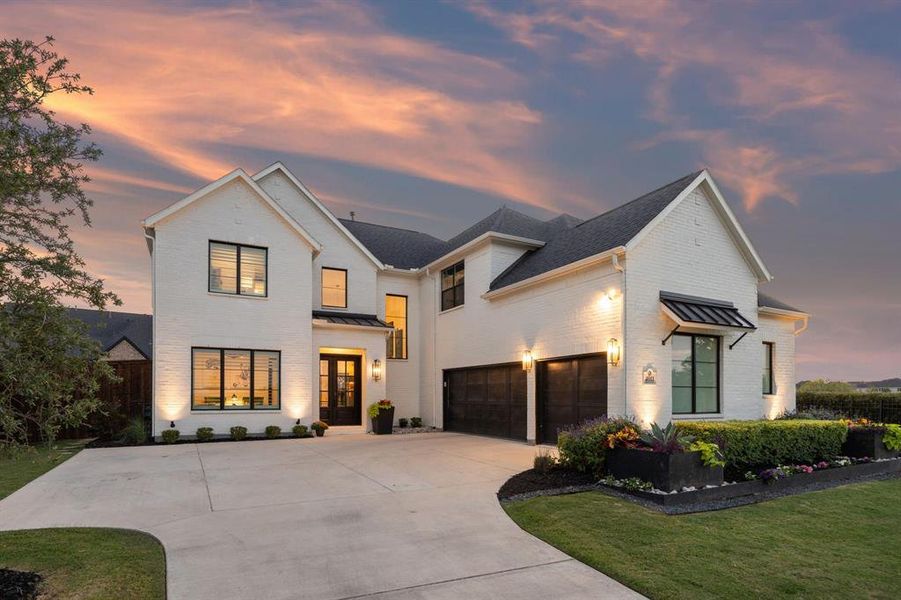 Front exterior of a new home in , Prosper, TX, highlighting curb appeal (Image 2). Front exterior of a new home in , Prosper, TX, highlighting curb appeal (Image 2).