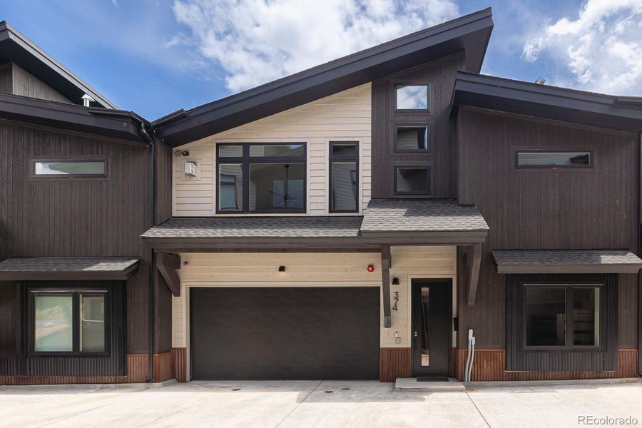 Front exterior of a new home in , Winter Park, CO, highlighting curb appeal (Image 2).