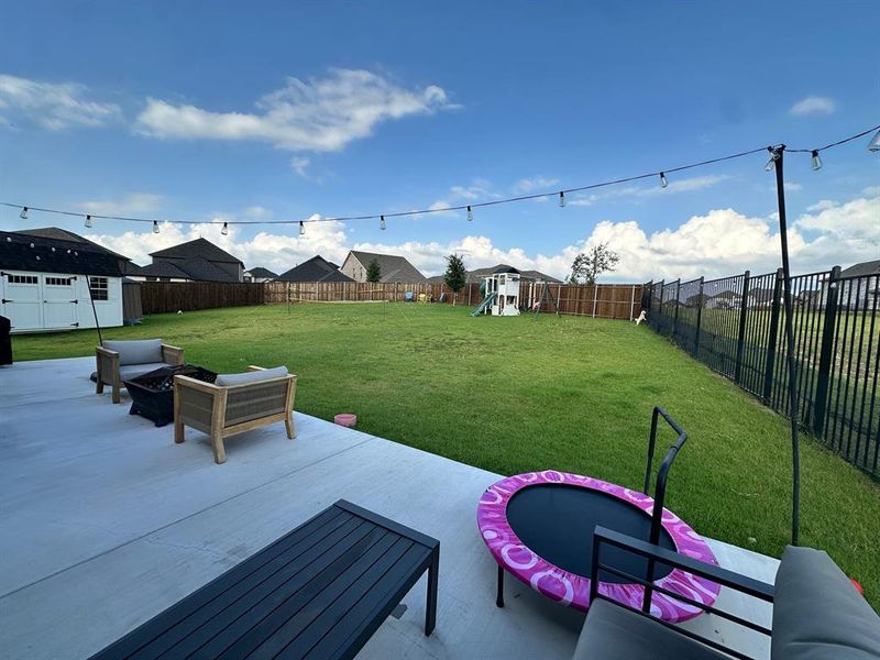 View of patio featuring a playground