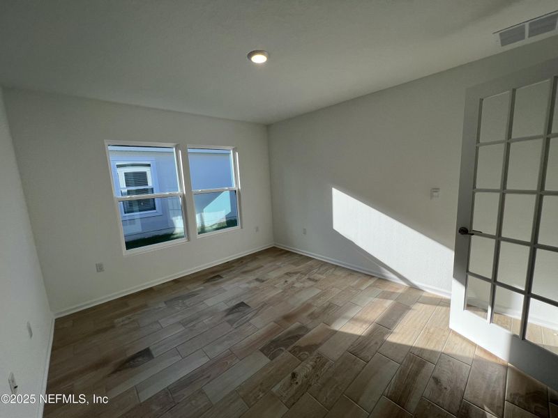 In-progress construction of a new home in American Village, Palm Coast, FL (Image 40).