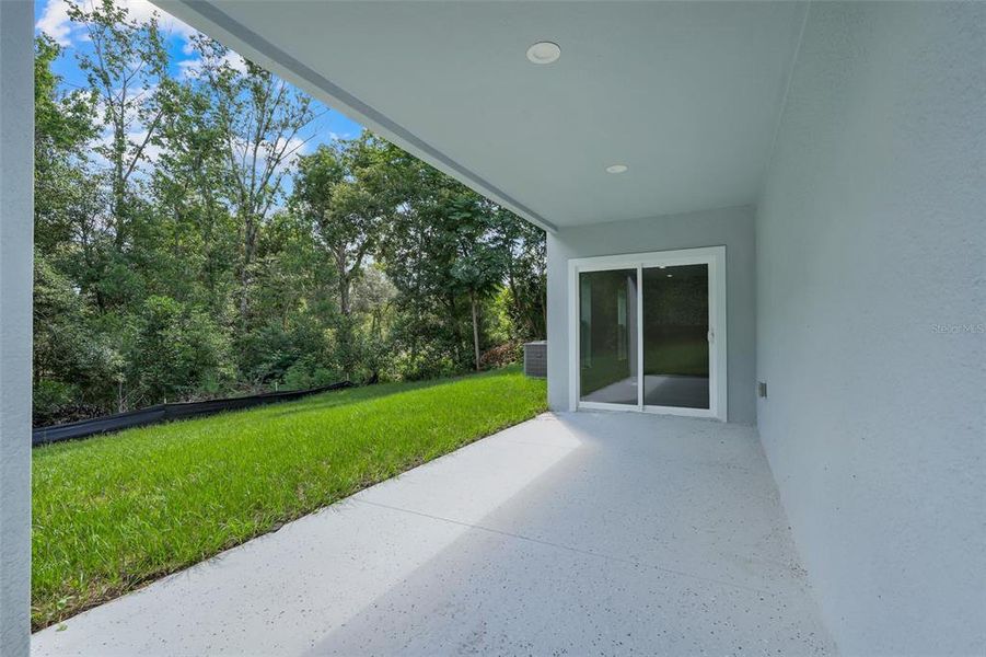 Exterior details and patio area of a home in , Deltona (Image 26).
