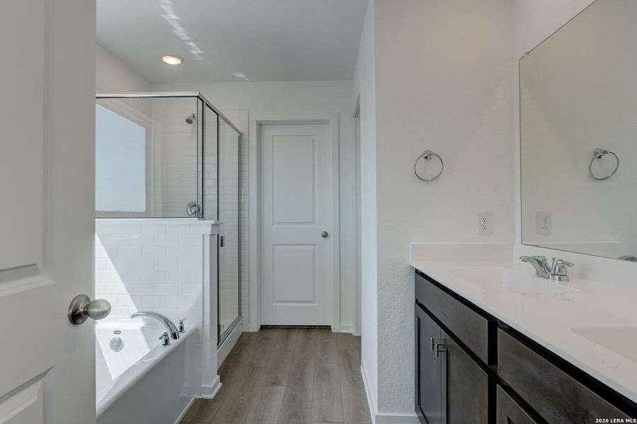 Furnished interior view inside a new home in Hennersby Hollow, San Antonio (Image 14).