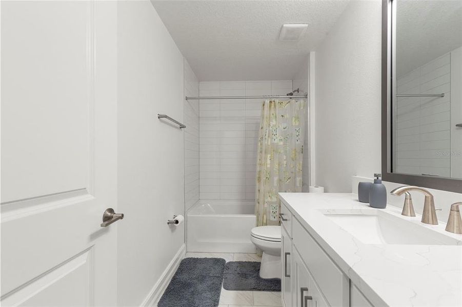 Furnished interior view inside a new home in Townes at Manhattan Crossing, Tampa (Image 30).