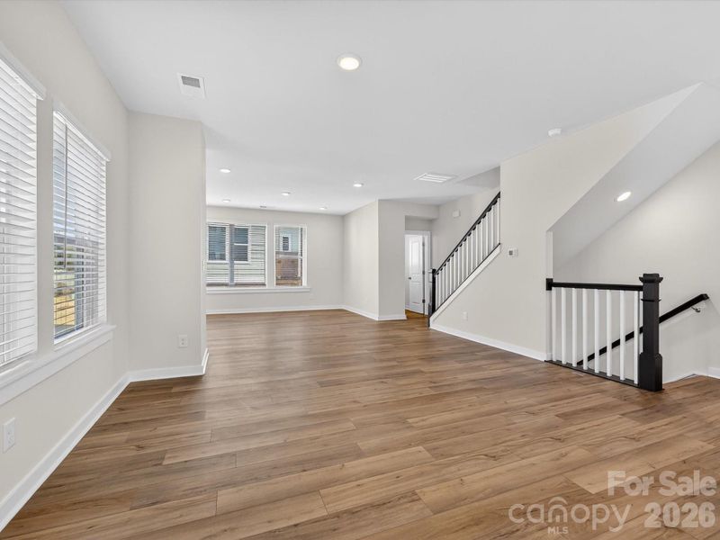 Spacious, unfurnished interior of a new home in Central Living at Craig, Charlotte (Image 21).