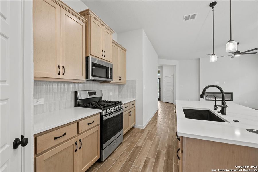 Furnished interior view inside a new home in Stream Waters, Seguin (Image 11).