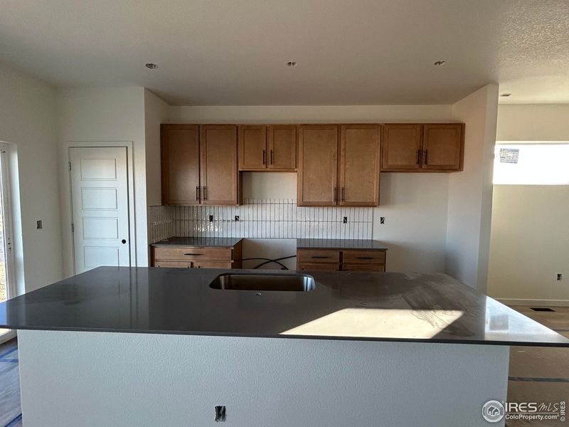 In-progress construction of a new home in Hudson Hills, Hudson, CO (Image 25).