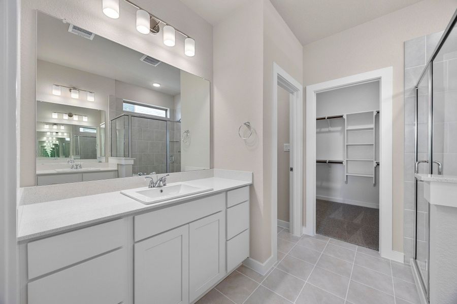 Primary Bathroom in the Magnolia home plan by Trophy Signature Homes – REPRESENTATIVE PHOTO Primary Bathroom in the Magnolia home plan by Trophy Signature Homes – REPRESENTATIVE PHOTO