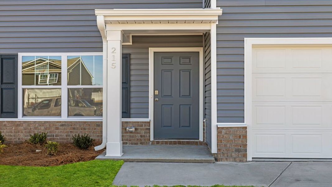Exterior details and patio area of a home in Bentley Park, Greenwood (Image 3).