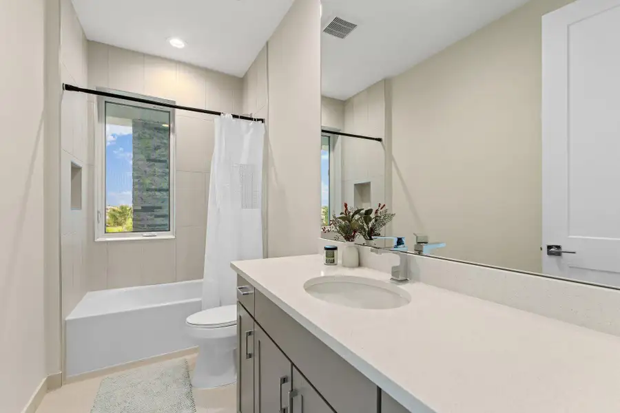 Furnished interior view inside a new home in Coral Isles at Avenir, Palm Beach Gardens (Image 6).