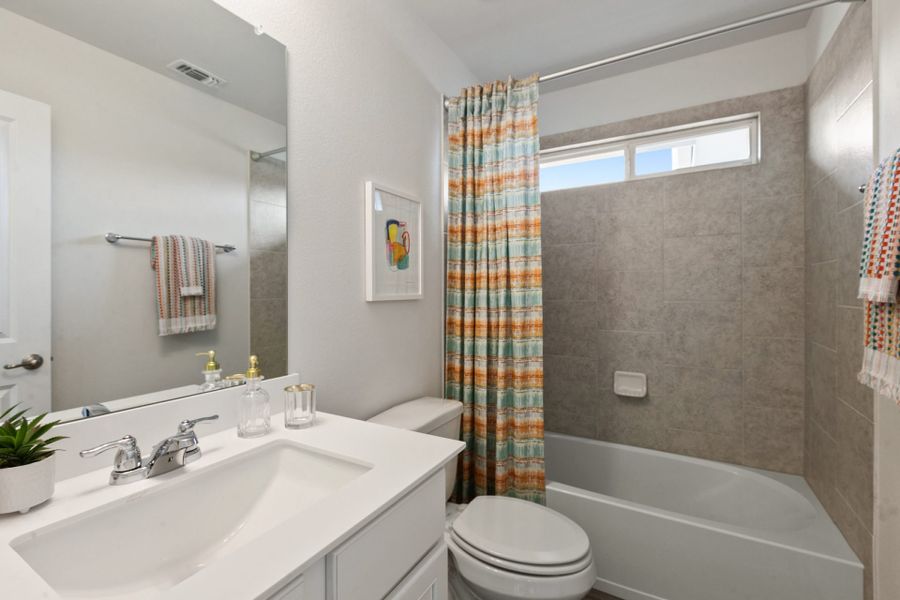 Furnished interior view inside a new home in Whisper Valley, Manor (Image 29).