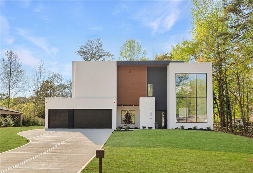 Front exterior of a new home in , Smyrna, GA, highlighting curb appeal (Image 1). Front exterior of a new home in , Smyrna, GA, highlighting curb appeal (Image 1).