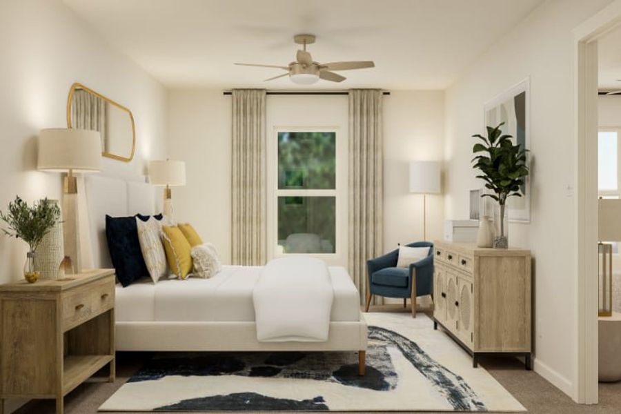 A living room with a white couch and a fan. A living room with a white couch and a fan.